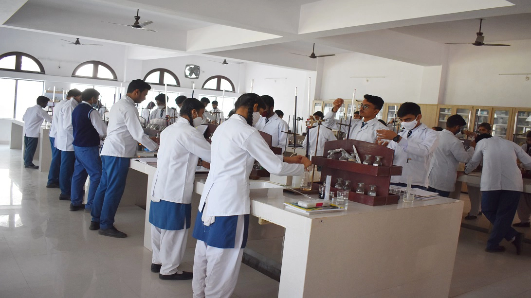 Students performing chemistry experiment